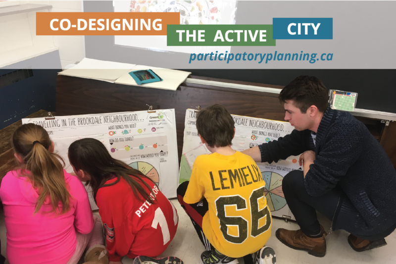 Three children are gathered around a poster board, a young man points to the board, the heading is Co-Designing the Active City